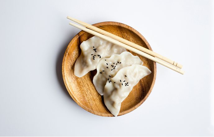 Dumplings served in a wooden bowl