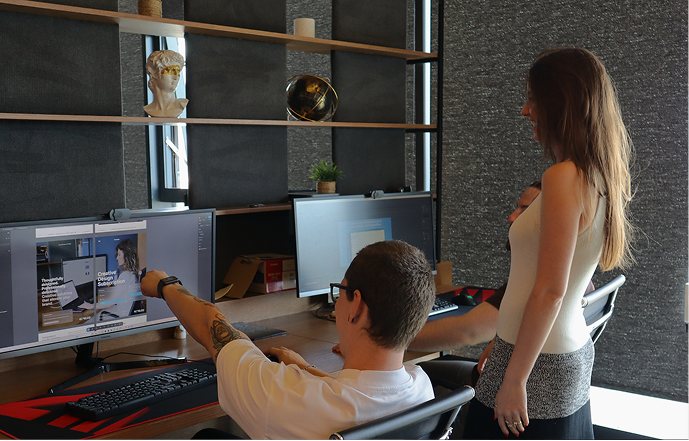 Two designers working at the studio