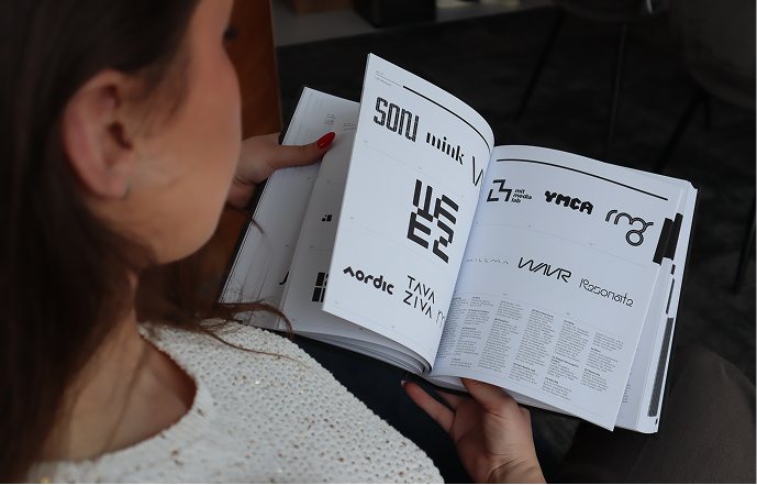 Turning the pages of a book of logos
