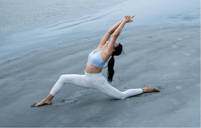 A yoga pose on the beach at first light